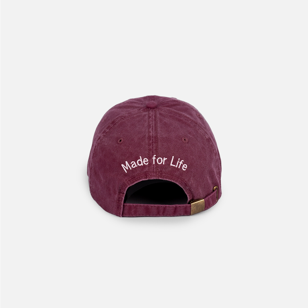 Rear view of the Burgundy Washed Cotton Cap, showing the adjustable closure and rear embroidery.