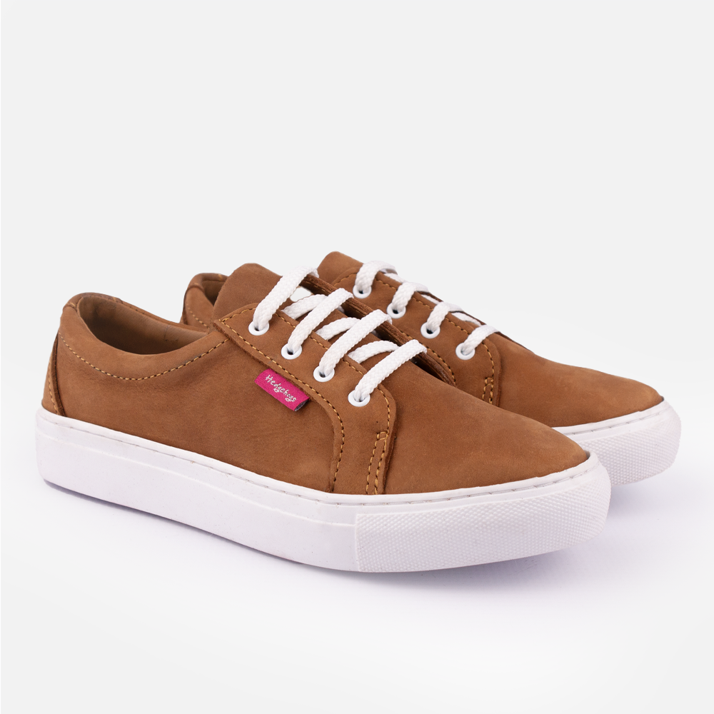 A pair of Hedgehogs Katrina ladies fashion sneaker in earthy tan nubuck, with white laces.
