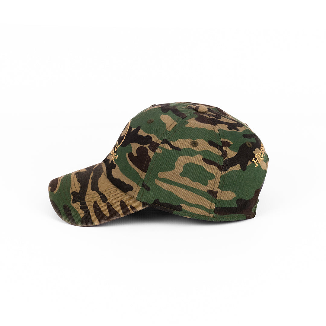 Side profile of the HippoCreek Camo Cap showing the structured peak shape.
