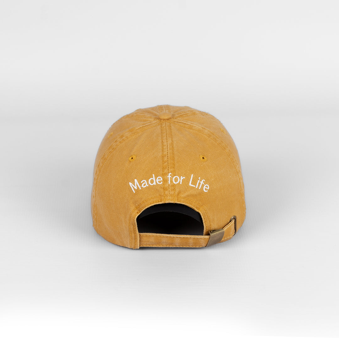 Rear view of the Mustard Washed Cotton Cap, showing the adjustable closure and subtle rear embroidery.