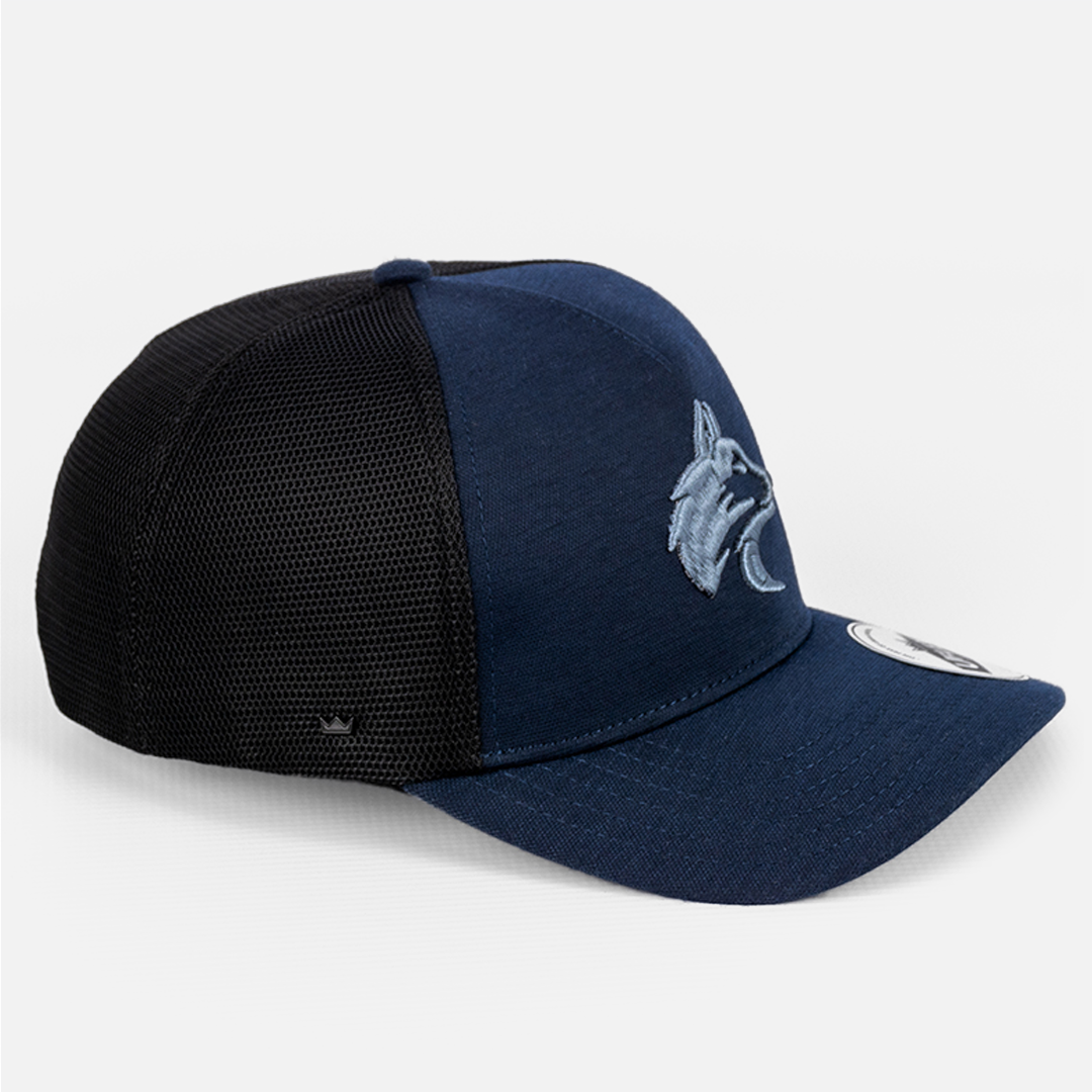 Rear view of the Navy Trucker Cap, detailing the breathable mesh panel construction.