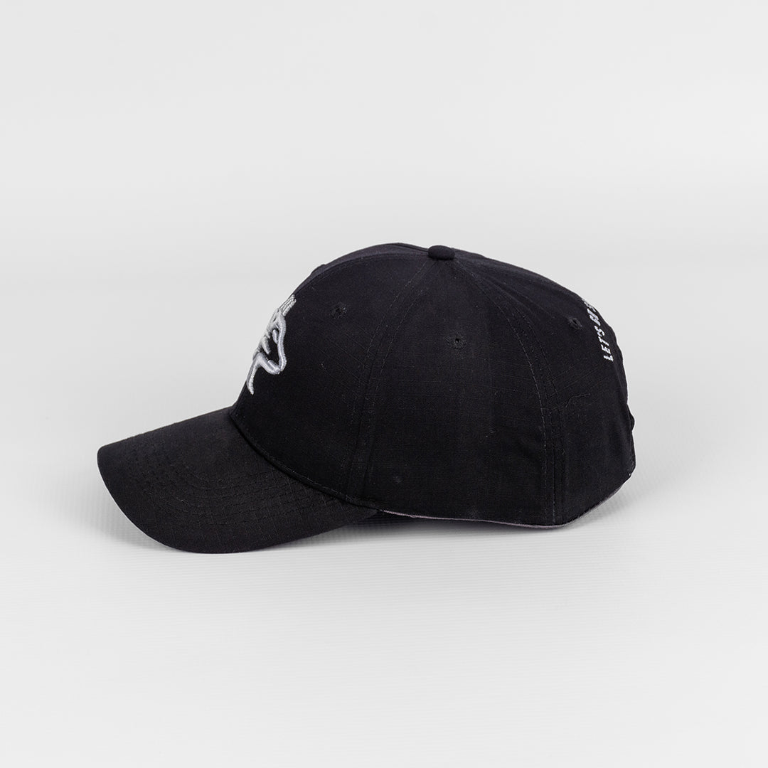 Alternate view showing the shape and structured peak of the Wolf Rock Black Rip Stop Cap