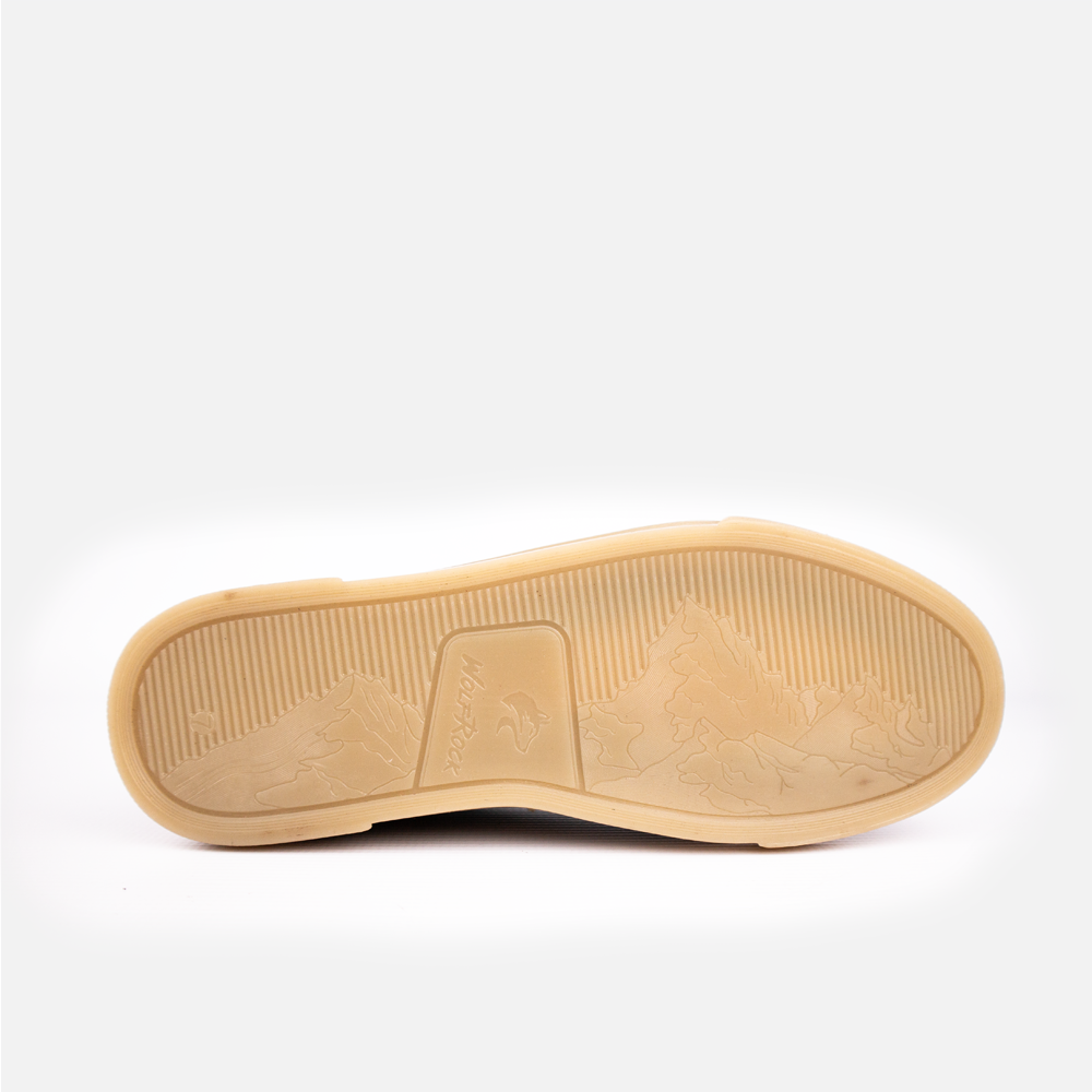 View of the men's Wolf Rock Cayden Sneaker branded durable rubber sole.