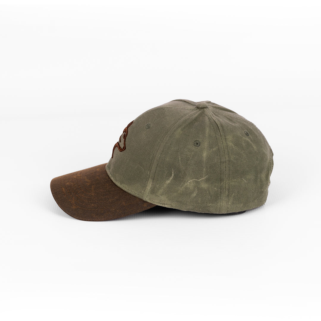 Alternate view of the Wolf Rock Embroidered Cotton Waxed Cap showing the logo detail.