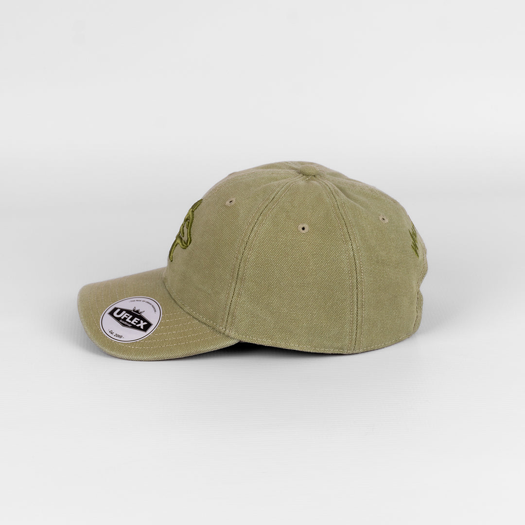 Alternate side profile of the Wolf Rock Green Canvas U-Flex cap showing side panels and U-Flex sticker of authentication.