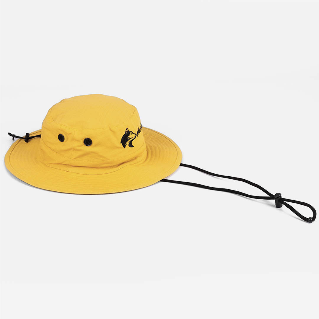 View of the Wolf Rock Wide Brim hat in mustard, showing the adjustable under-chin Rip Stop strap.