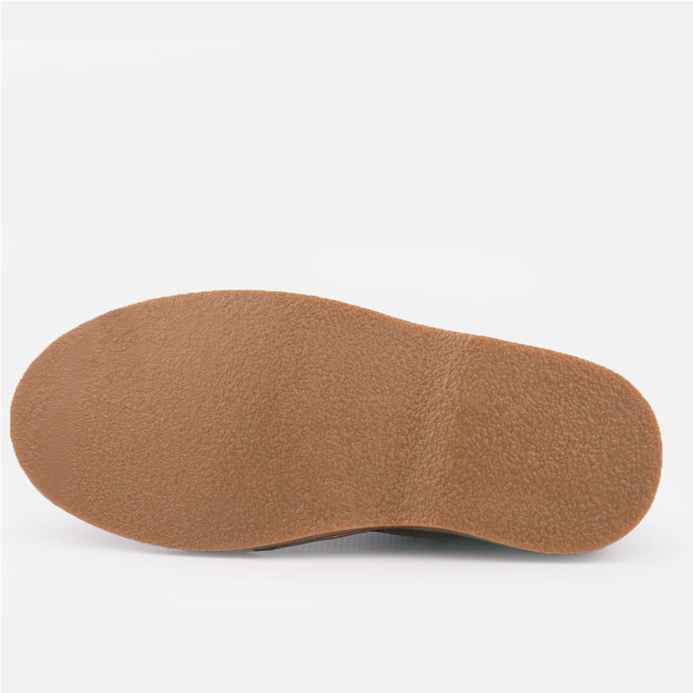 View of the durable rubber sole and base of the men's Wolf Rock Timber Casual Slip-On Boot.