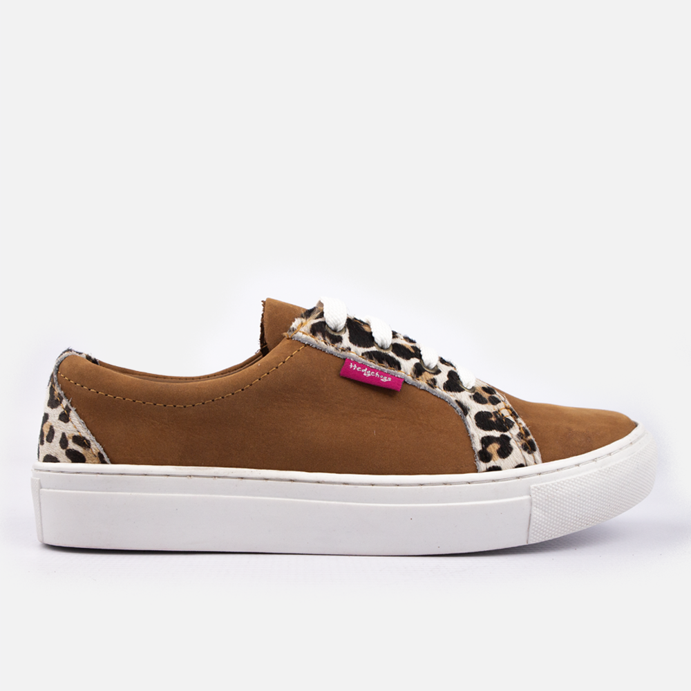 Side profile of the Hedgehogs Katrina Exotic Houston Tan sneaker showing the white cupsole and leopard-print lace panel.