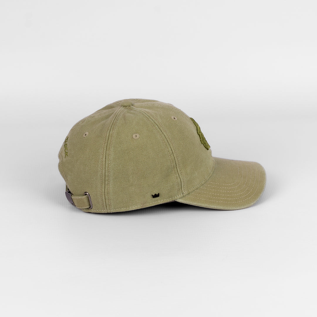 Side profile of the Green U-Flex cap, showing the curved peak and shape-retaining flexibility.