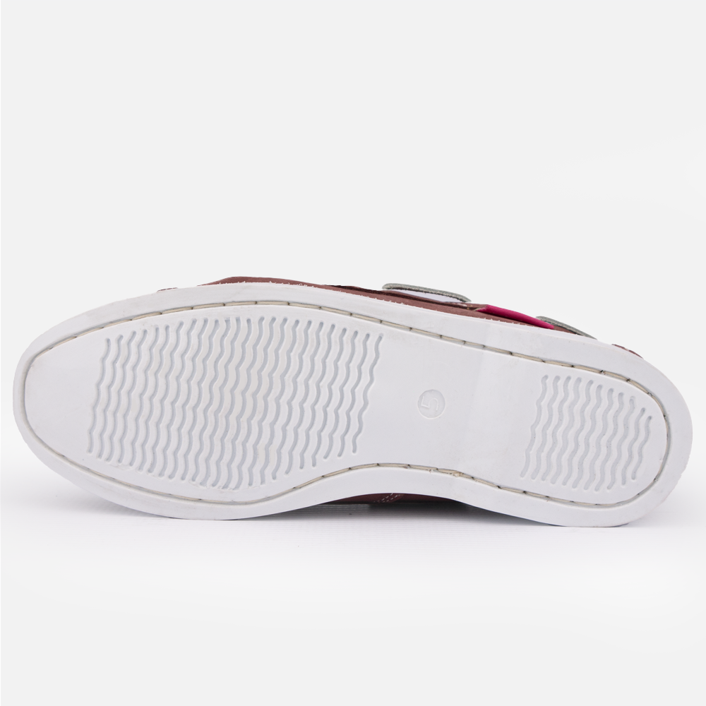Sole view of the Hedgehogs Bianca boat shoe in burgundy nubuck.