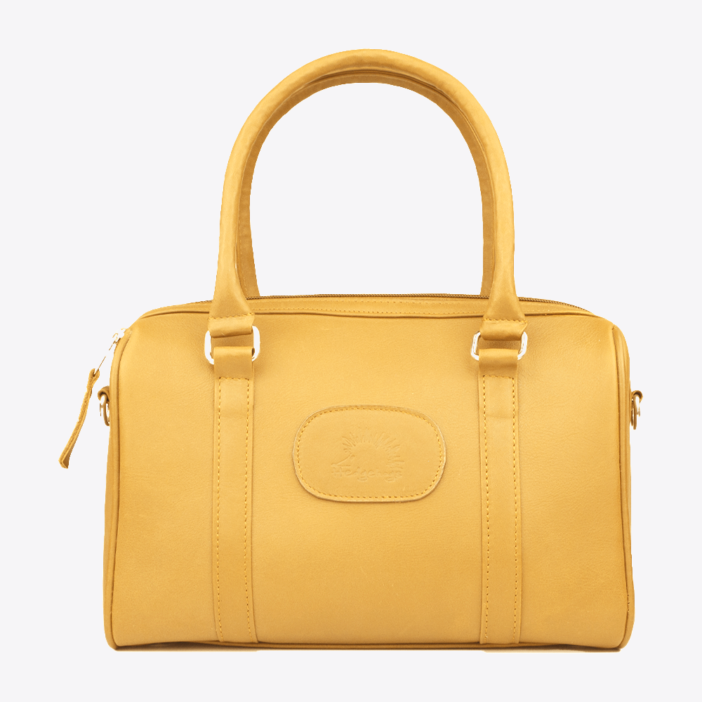 Main view of the Hedgehogs Ochre Leather Bowler handbag showing handles and front logo embossing. 