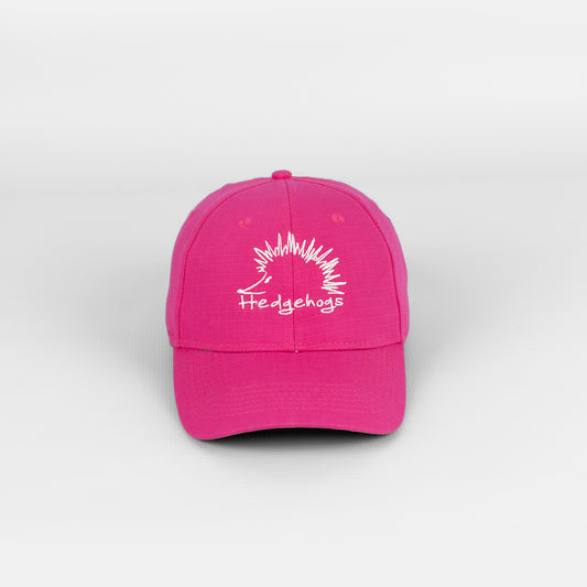 Front view of the Hedgehogs Ladies Cerise Rip Stop Cap, featuring subtle white logo embroidery. 