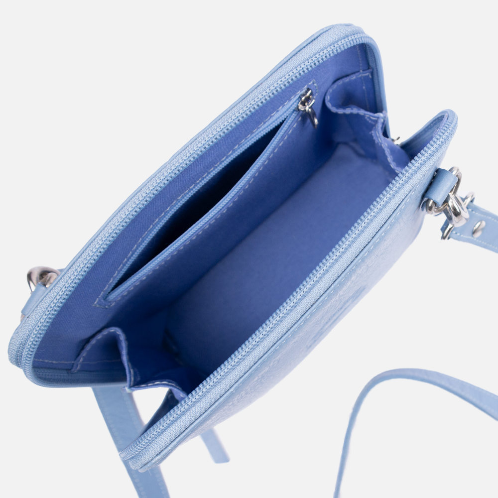 Internal view of the Hedgehogs clutch bag in baby blue leather, showing the internal pockets and matching baby blue lining.
