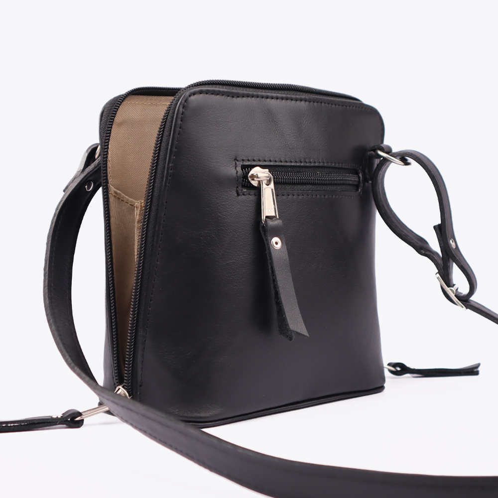 Rear view of the Hedgehogs clutch bag in black leather showing the external pocket