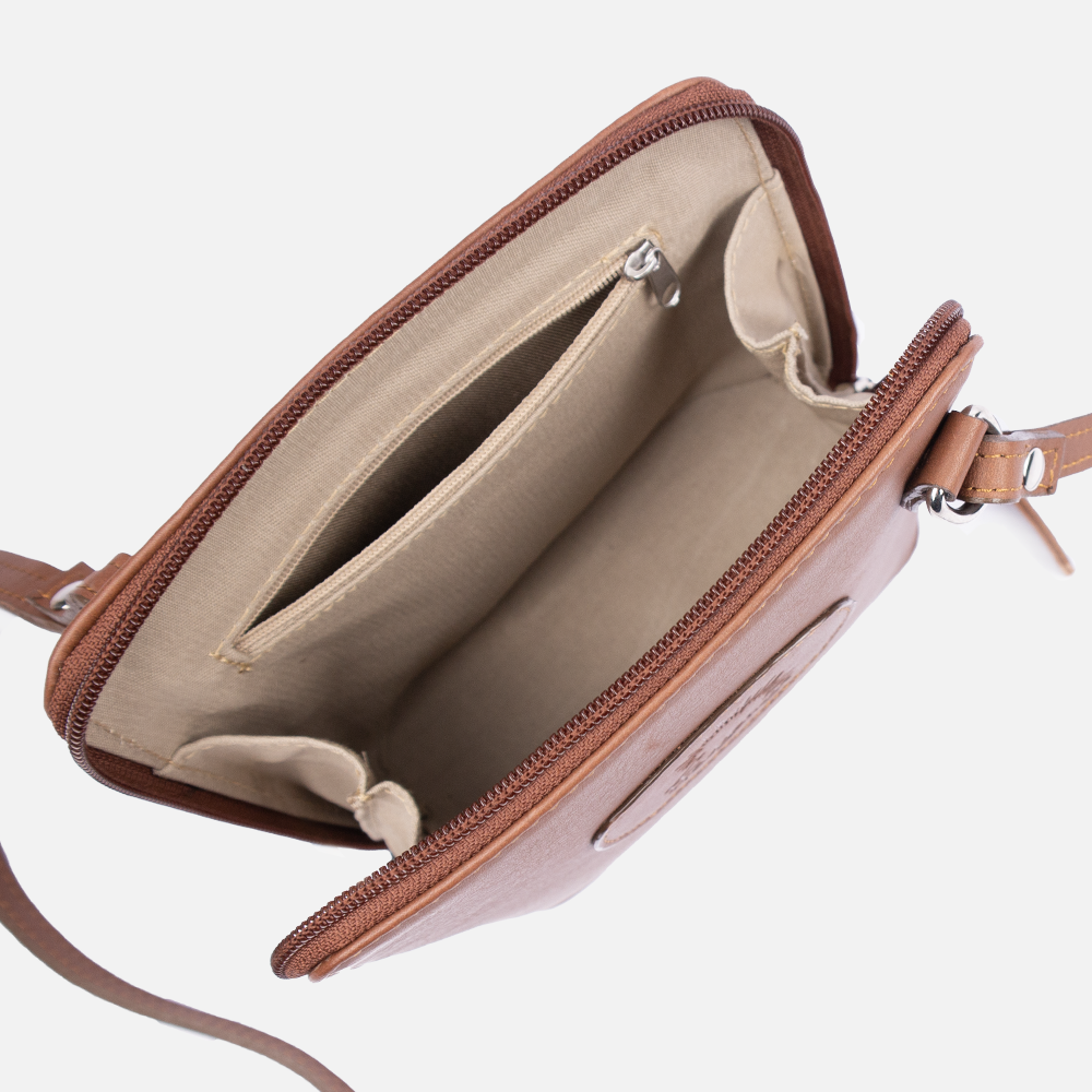 Internal view of the Hedgehogs chocolate leather clutch bag showing internal pockets, lining and zip closure. 