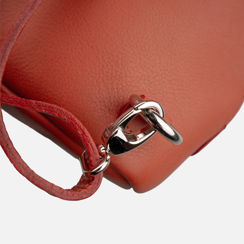 Close up view of the removable and adjustable strap on the Hedgehogs ladies convertible backpack