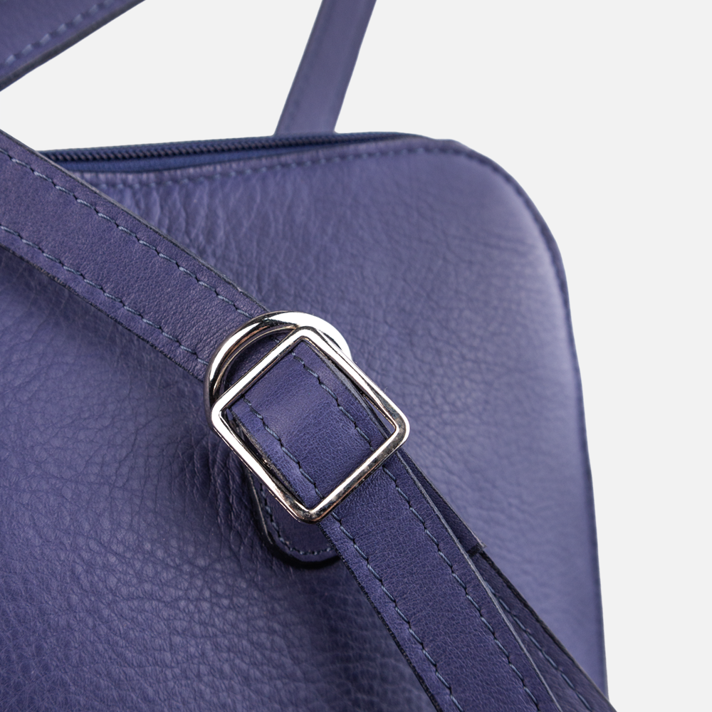 Close up view of the buckle detail on the Hedgehogs ladies indigo leather convertible backpack