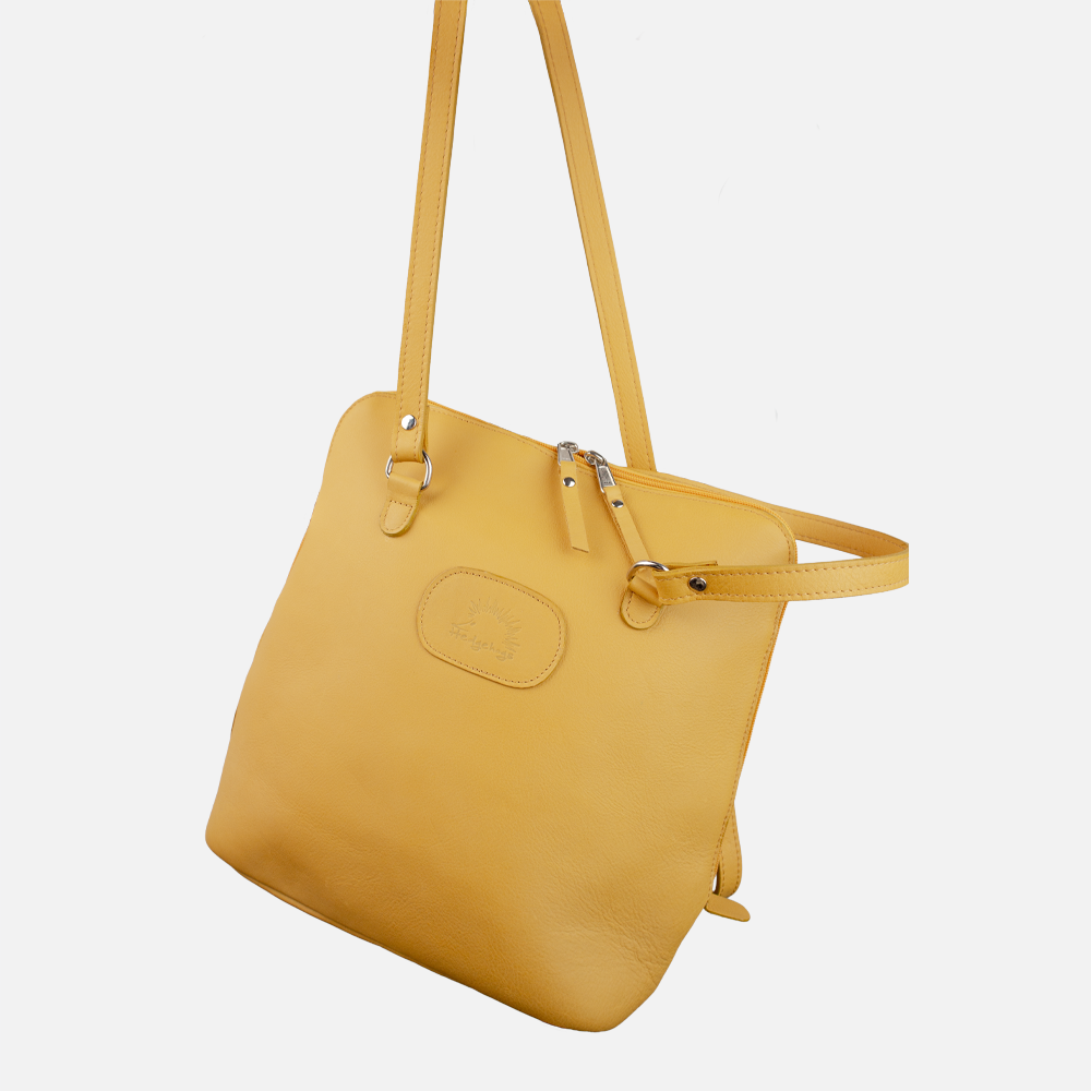 Alternate view of the Hedgehogs ladies convertible backpack in ochre yellow full grain leather. 