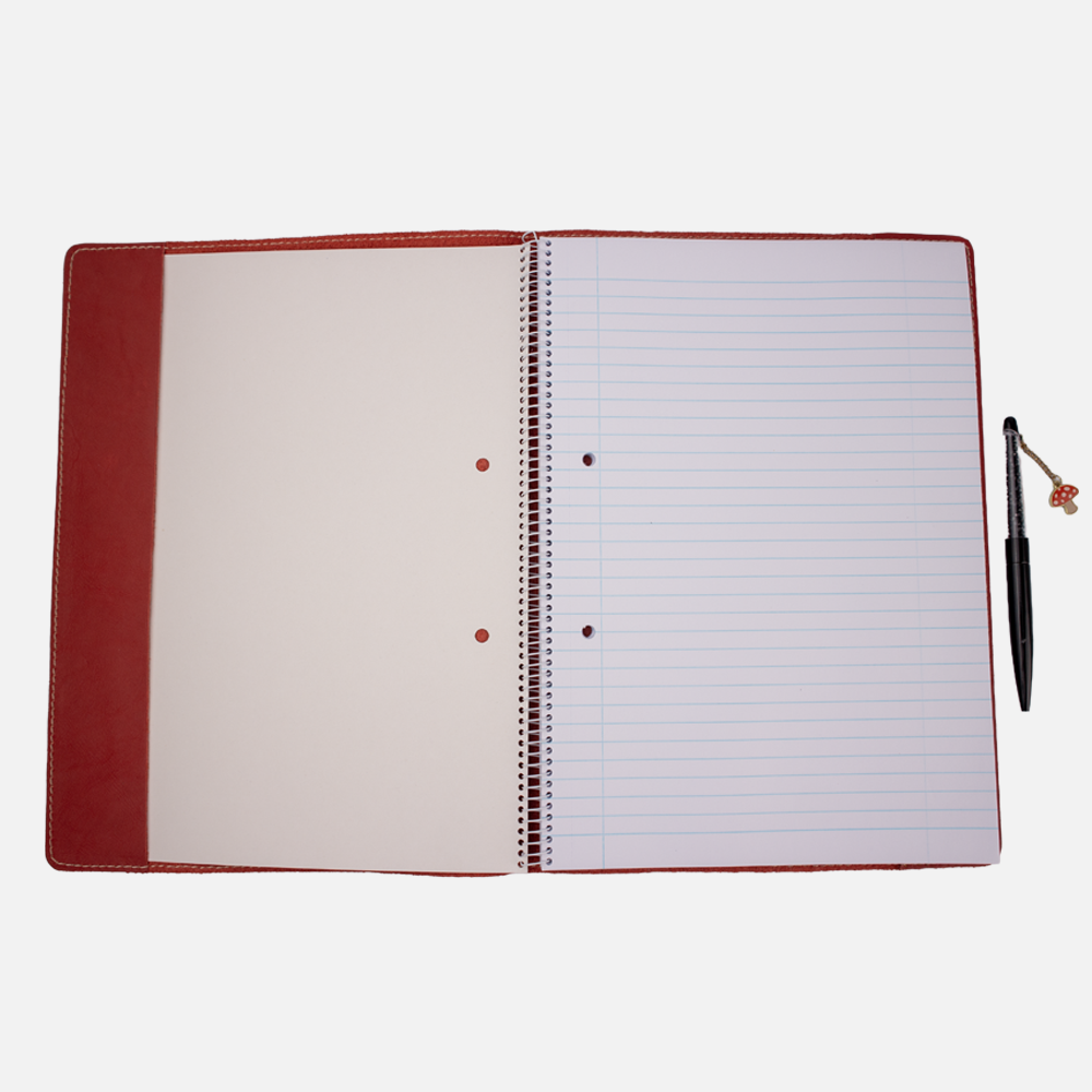 View of the Hedgehogs ladies full grain leather A4 notebook cover showing the fit of a notebook. 