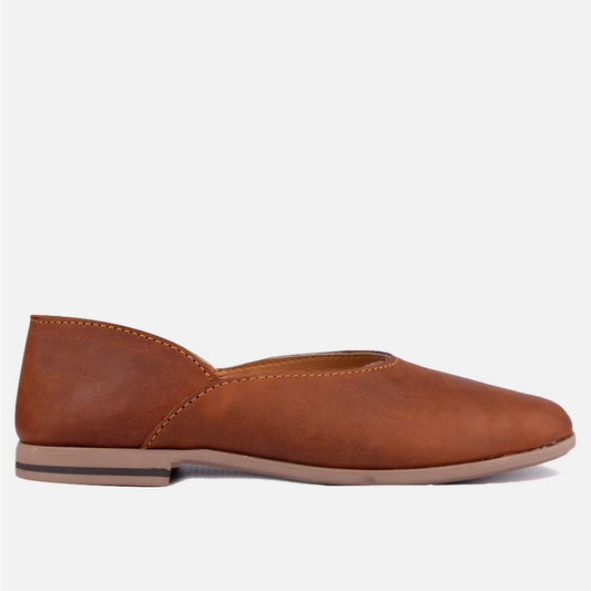 Side view of the Hedgehogs Hayley flat pump-style show in rich cognac full grain leather.