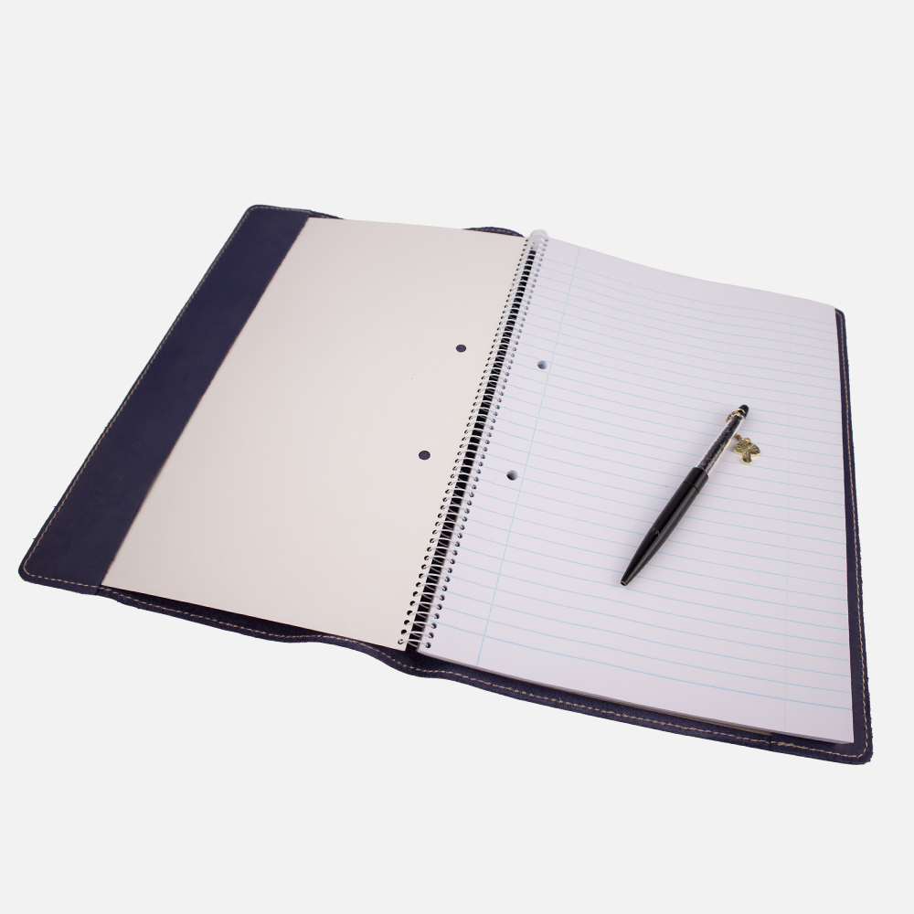 Internal view of the Hedgehogs A4 full grain leather notebook cover in Indigo leather, showing the fitting of a notebook inside.