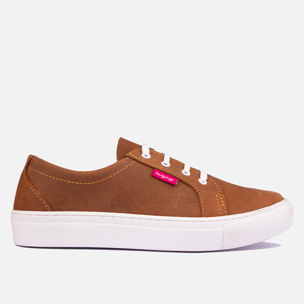 Side profile on the Hedgehogs Katrina fashion sneaker in earthy tan Nubuck with white laces.