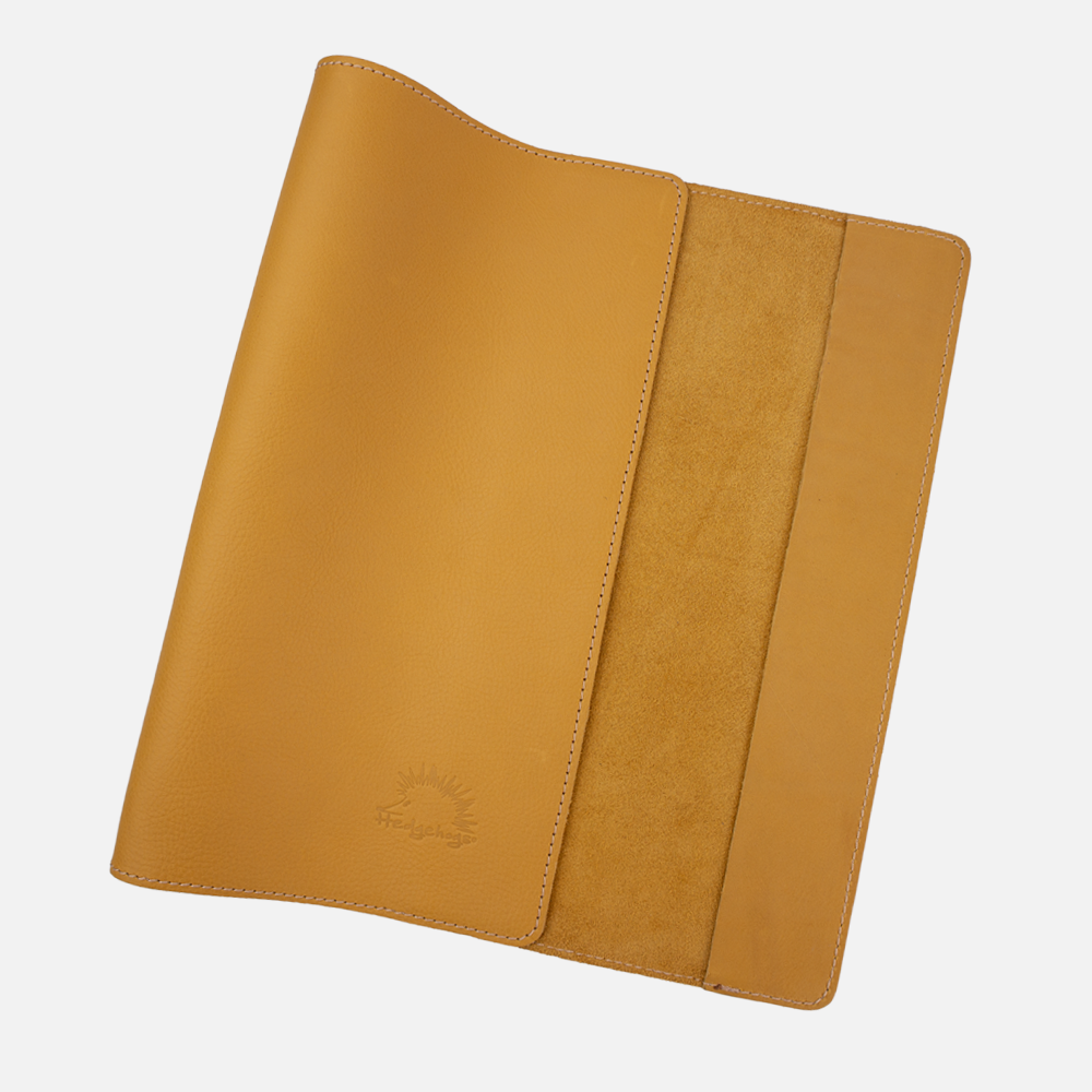 Internal view of the Hedgehogs full grain leather A4 notebook cover in ochre yellow leather, showing the internal sleeve.