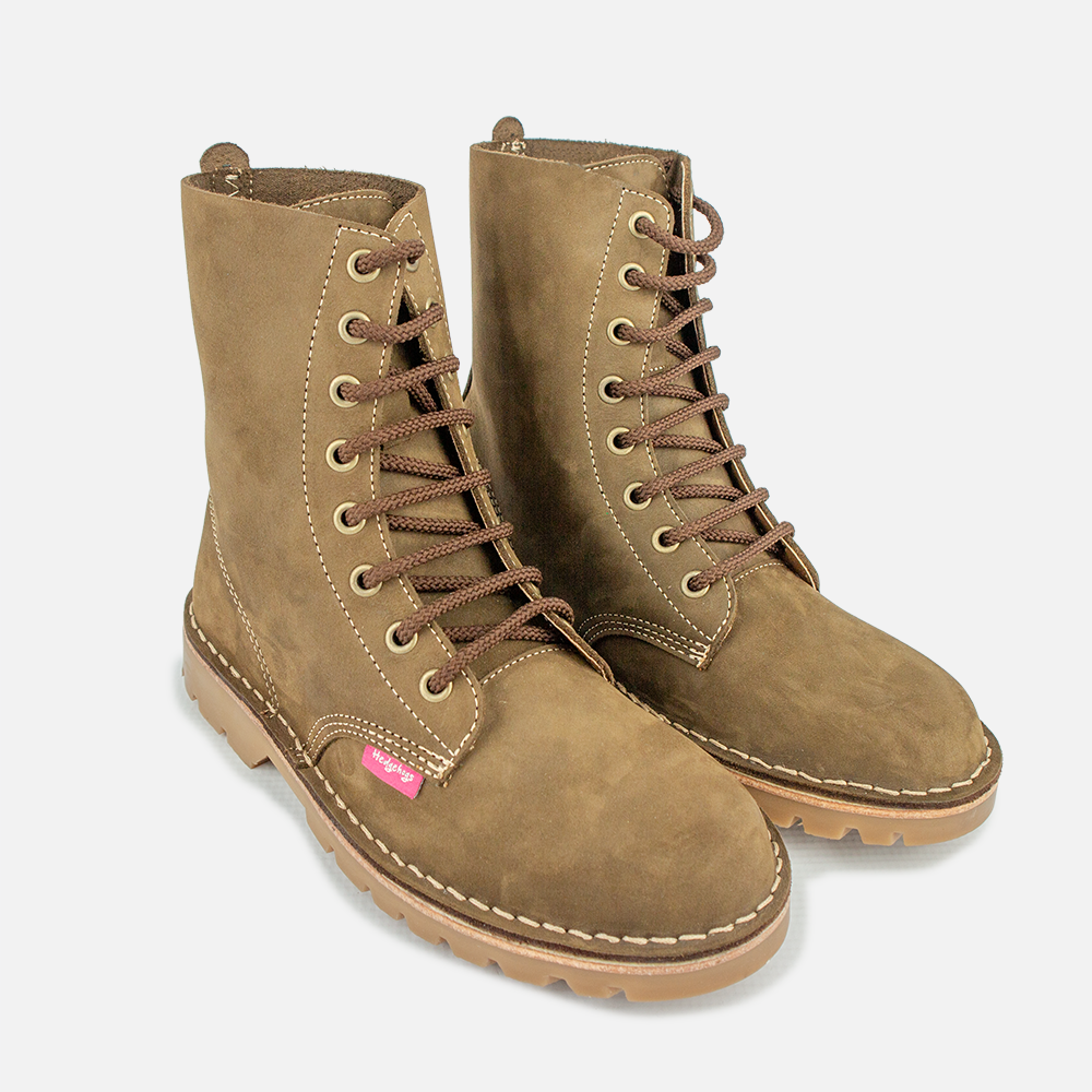 A pair of hedgehogs Sia ladies combat boots in a rich olive green nubuck, showing the lace up front.