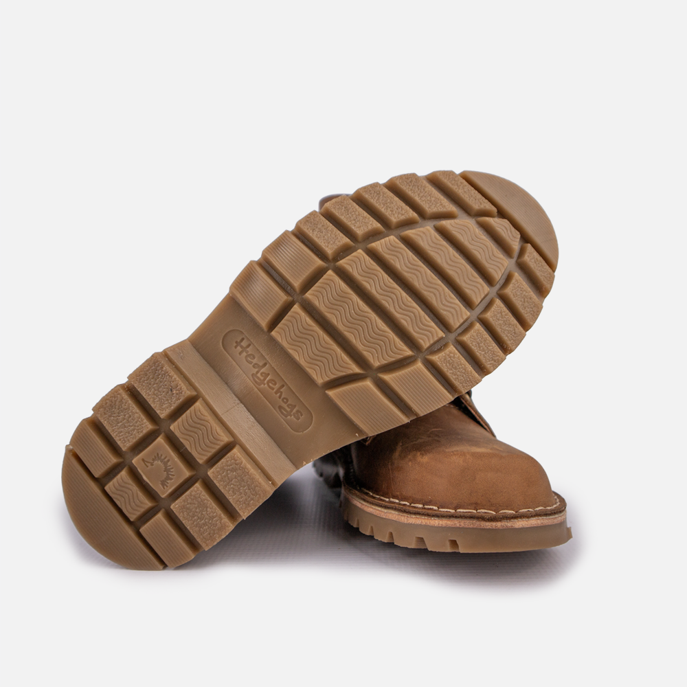 Sole view of the Hedgehogs branded chunky sole on the Sia boot.