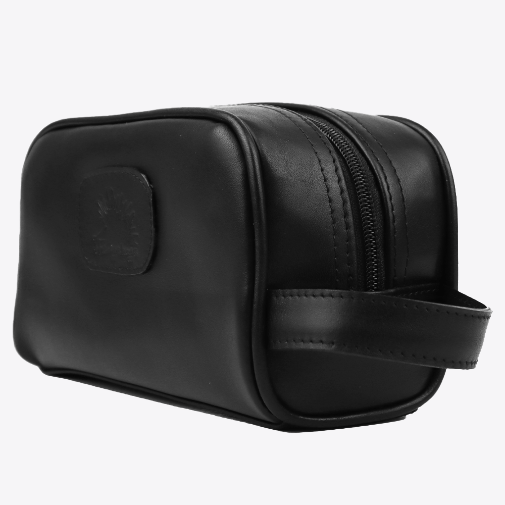 View of the Hedgehogs ladies black leather toiletry bag, showing side strap.