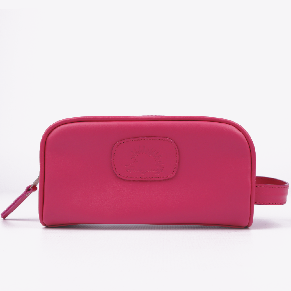 Main view of the Hedgehogs ladies toiletry bag in cerise pink leather. 