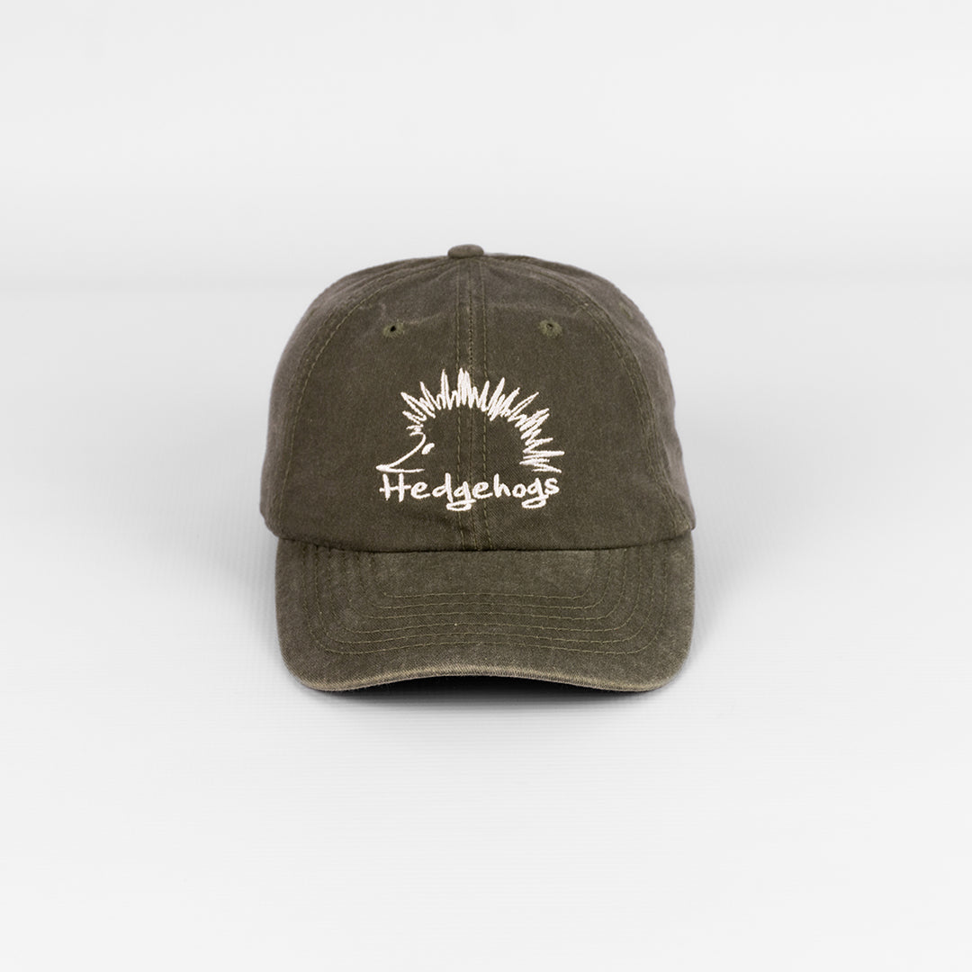 Front view of the Hedgehogs Washed Cotton Cap in Olive, featuring the front logo embroidery.