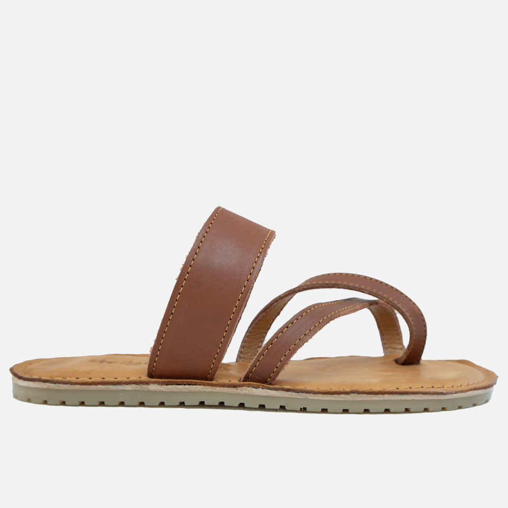 Side profile of the Hedgehogs Wendy ladies scrappy leather sandal in cognac leather. 