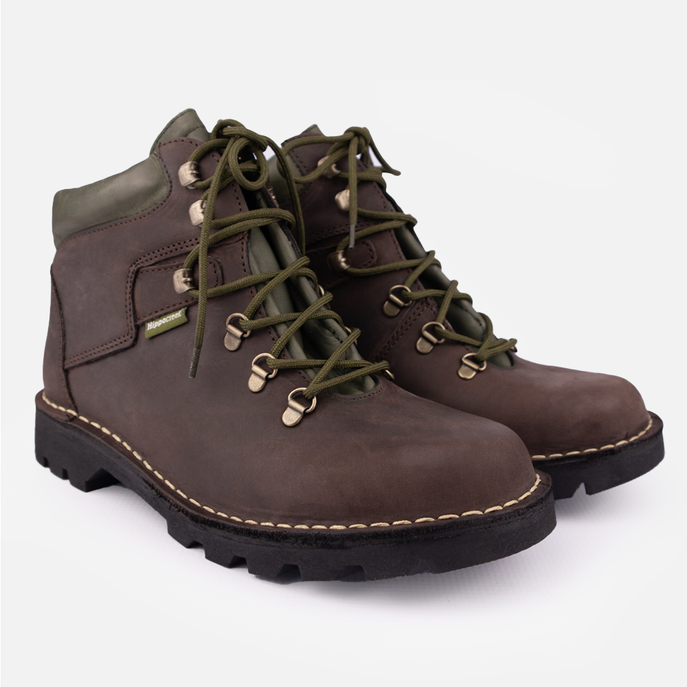 A pair of HippoCreek Boulder Boots showing dark chocolate leather, olive green collar and lace detail. 
