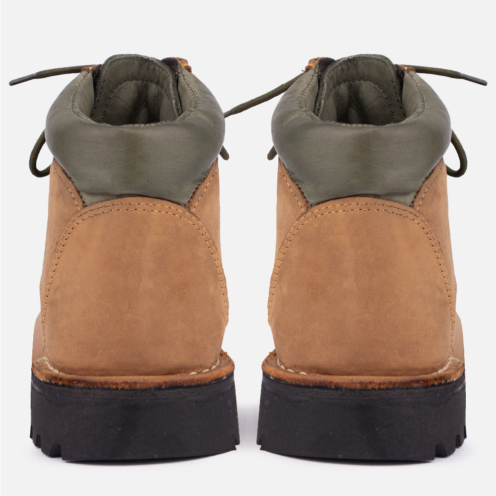 Rear view of the HippoCreek Boulder Boot showing the stitch detail on the heel and golive green heel collar. 