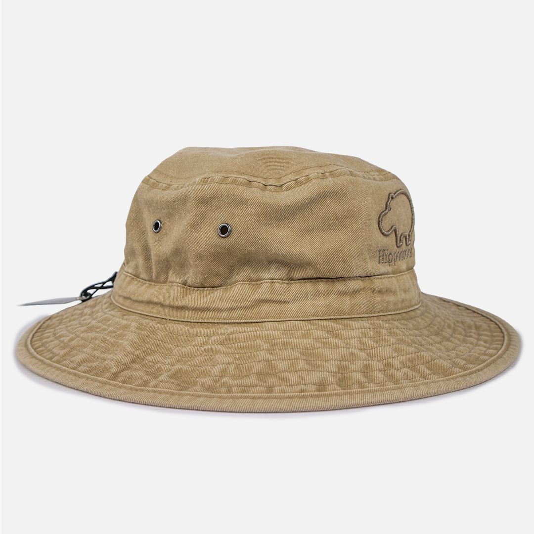 Angled view showing the wide brim and the rugged, distressed texture of the Khaki bush hat.