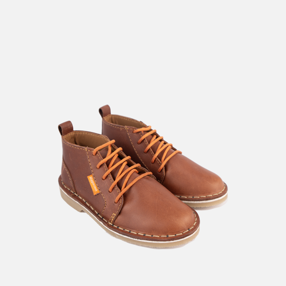 Top view of the HippoCreek Kids Owl Leather Boot in Cognac with orange laces, a durable children's genuine leather boot.