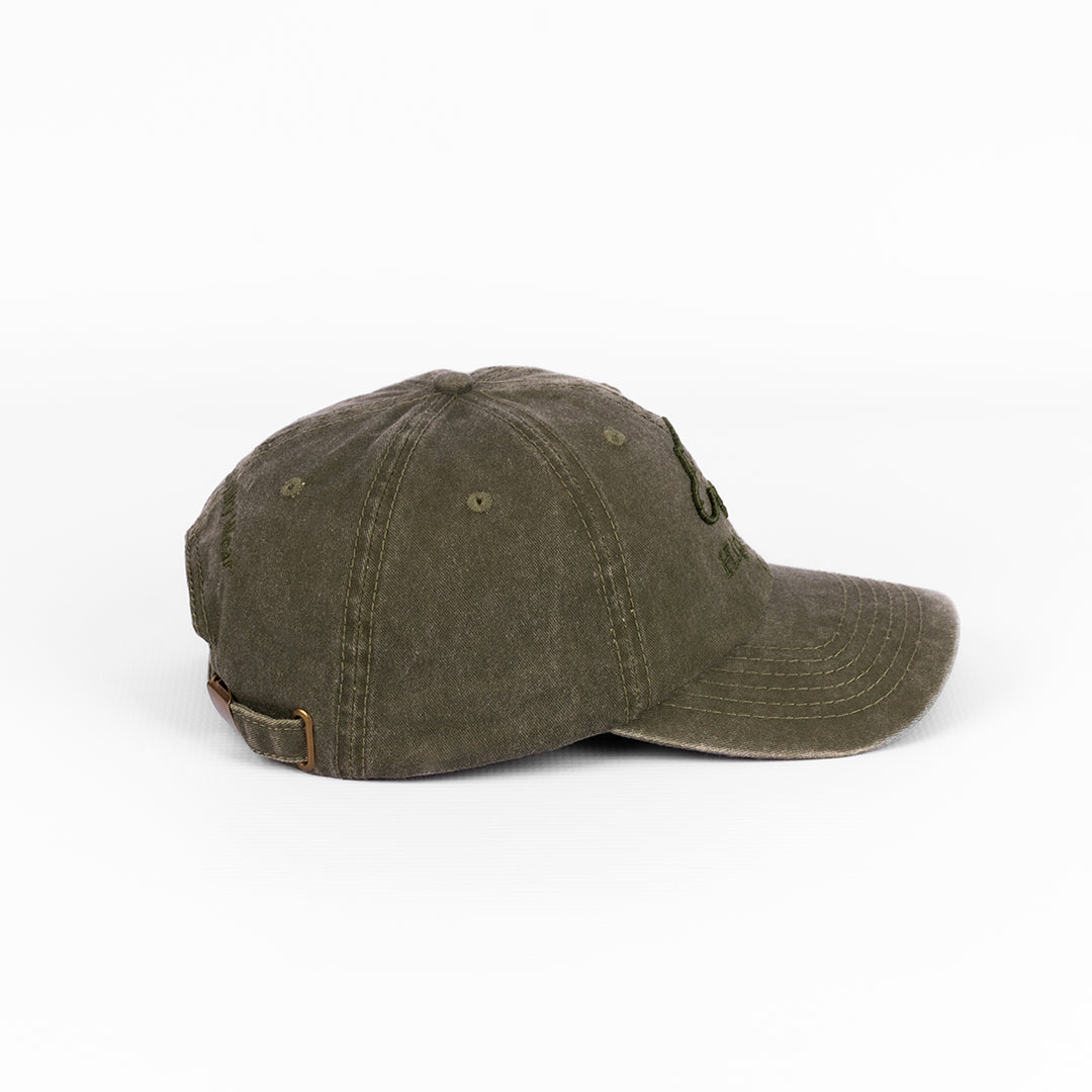 Side profile of the Olive Washed Cotton Cap, detailing the six-panel construction.