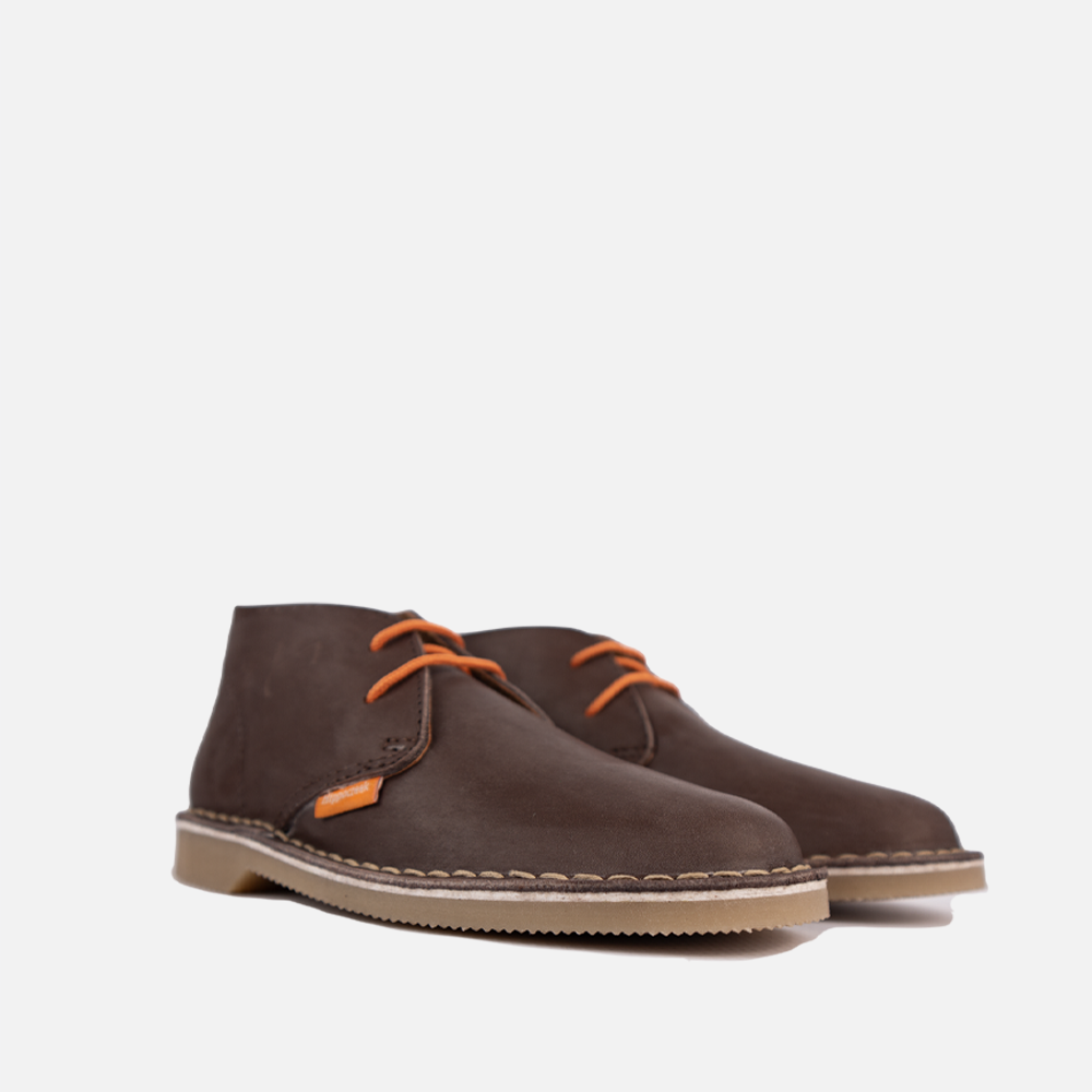 Close-up view of the sturdy lace-up closure and high-quality genuine leather of the HippoCreek Youths Lemur Mid Boot.