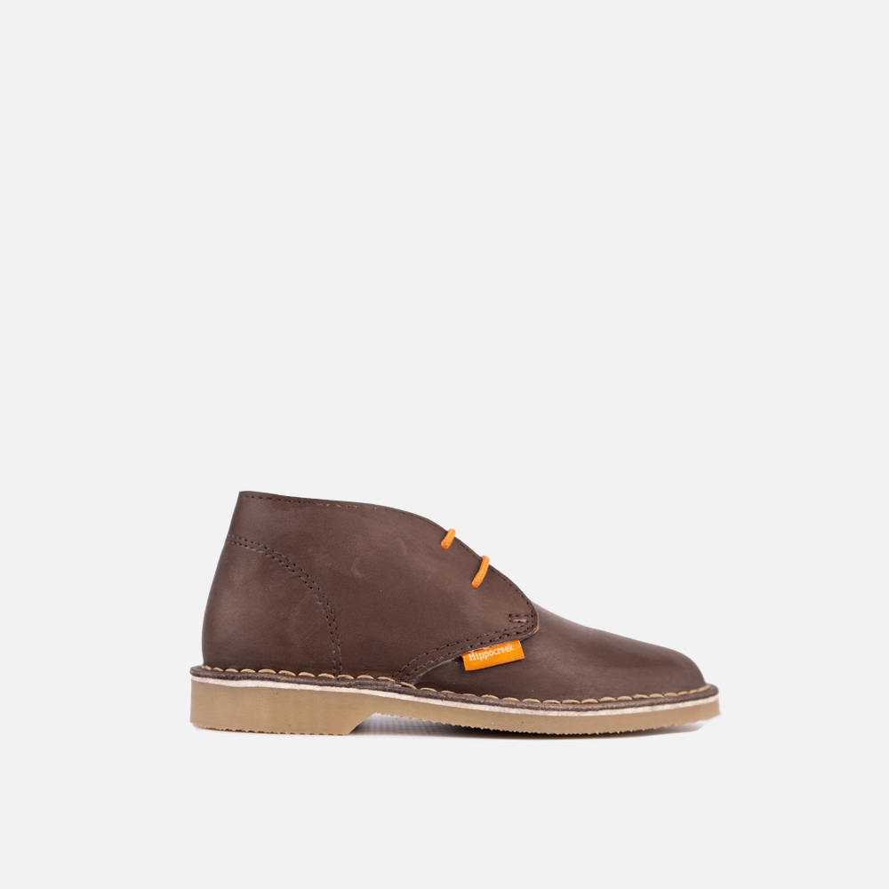 Side view of the HippoCreek Youths Lemur Mid Boot in Choc genuine leather, a durable youth leather boot with ankle support.