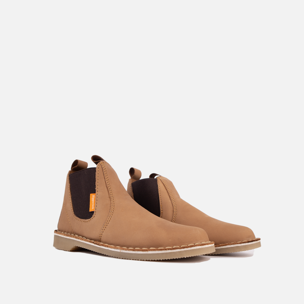 Pair of the HippoCreek Youths Possum Leather Boot in Santiago Dark Choc, a durable, full-grain leather slip-on utility boot for older kids and teens. 