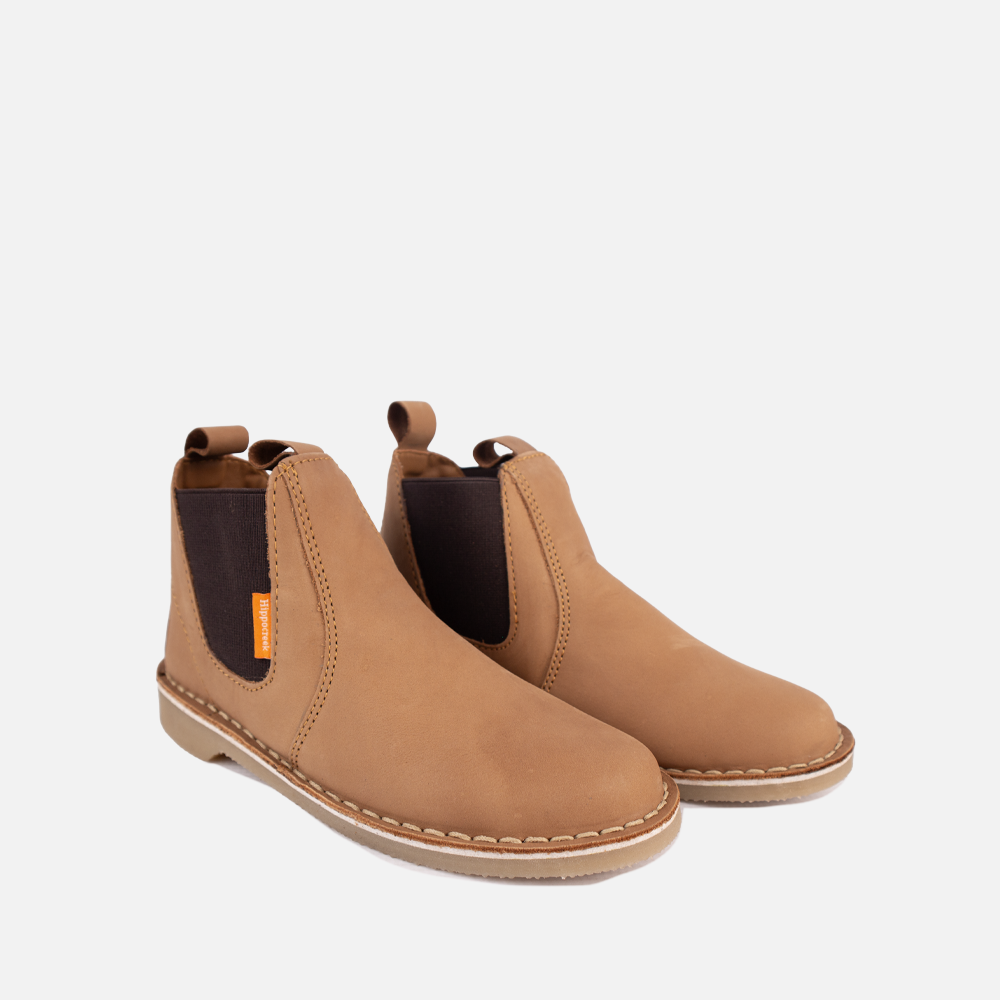 Pair of the HippoCreek Youths Possum Leather Boot in Santiago Dark Choc, a durable youth genuine leather slip-on utility boot.