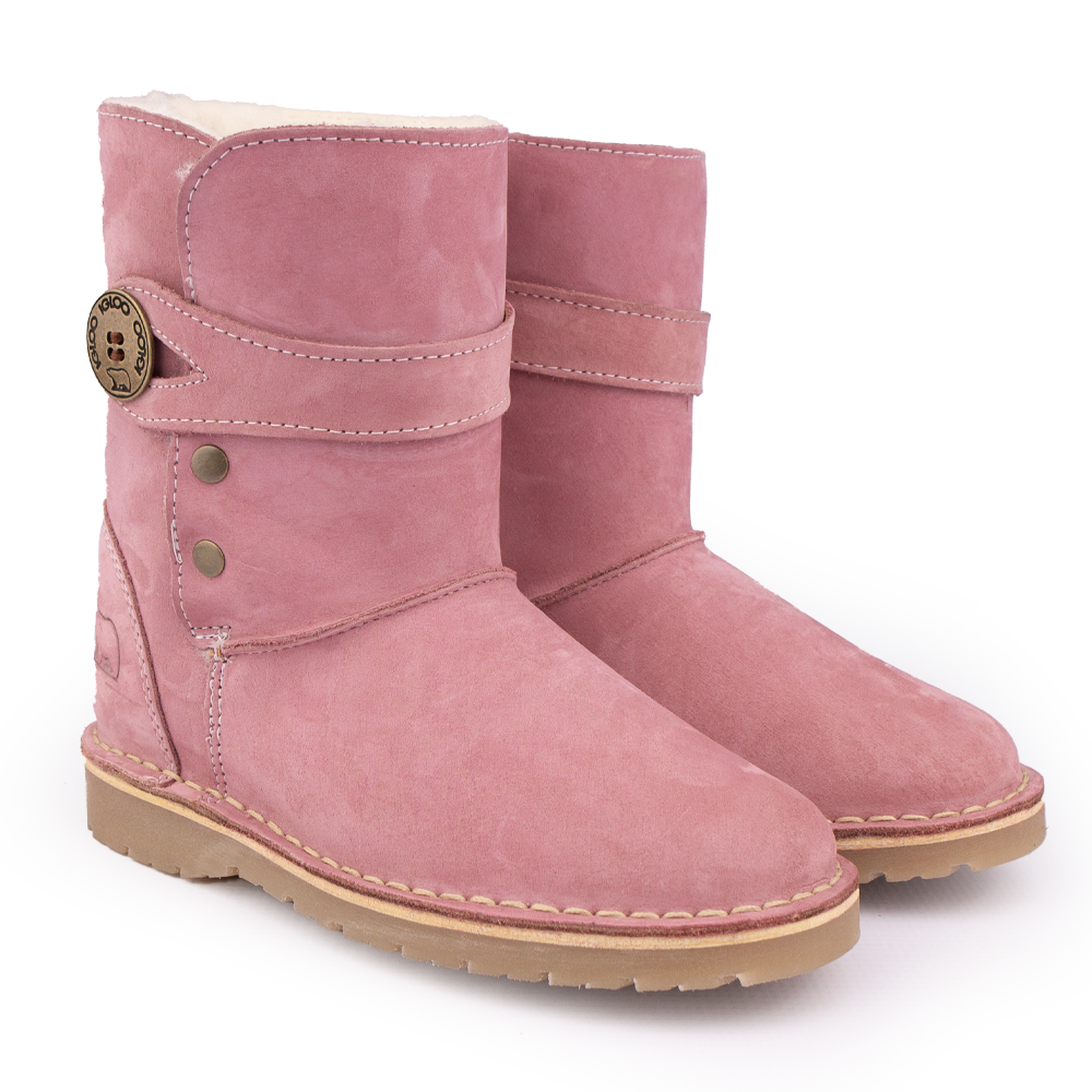 Side View of a pair of the Igloo Alaska Pink Boot, a women's sheepskin winter boot with a pink suede upper.