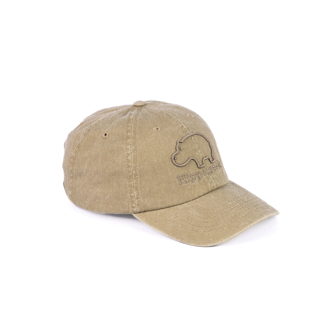 Angled view of the HippoCreek Khaki cap, showing the curved peak and soft texture.