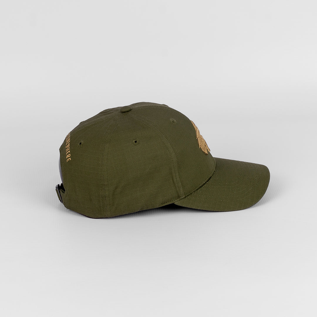 Close-up detail of the reinforced Rip Stop fabric weave on the Olive cap.