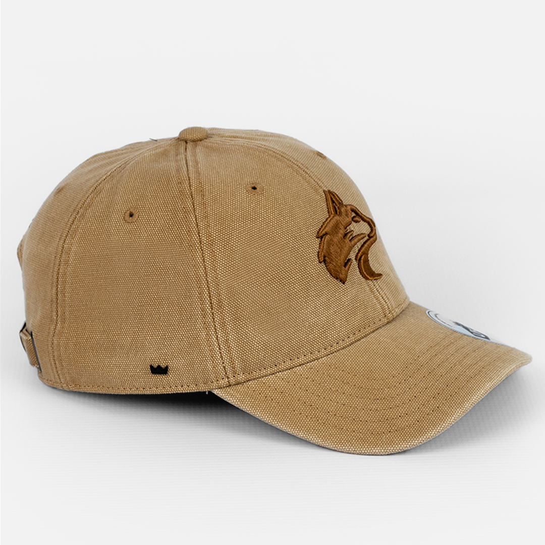 Side profile of the Tan U-Flex cap, showing the curved peak and shape-retaining flexibility.