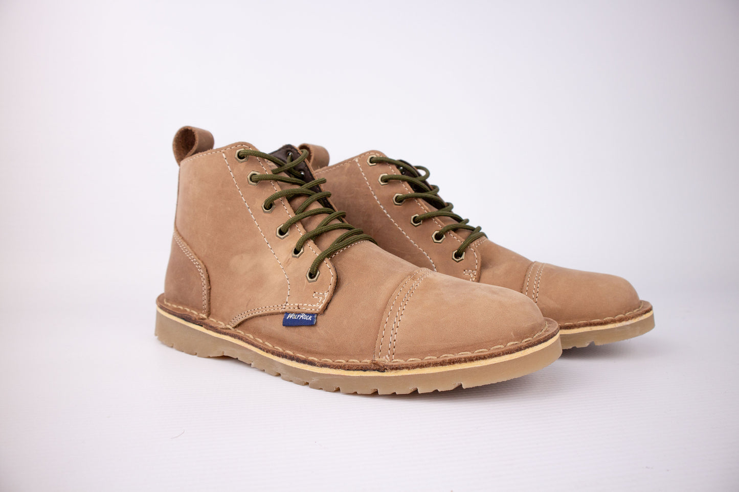 A pair of Wolf Rock Baxter Boots in Stone leather, a men's handcrafted vellie/chukka shoe