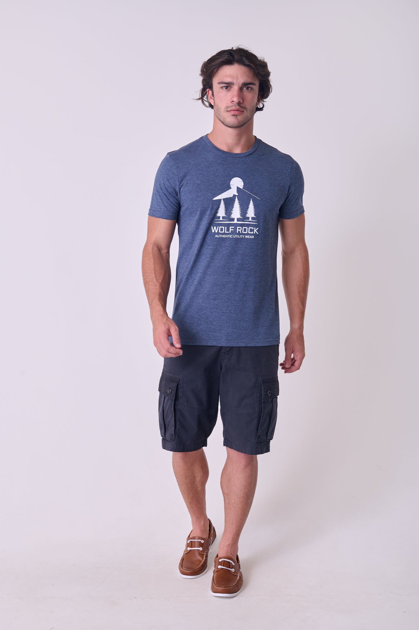 Front view of the Wolf Rock Bergface Tee in Navy Mélange, featuring the mountain landscape graphic.