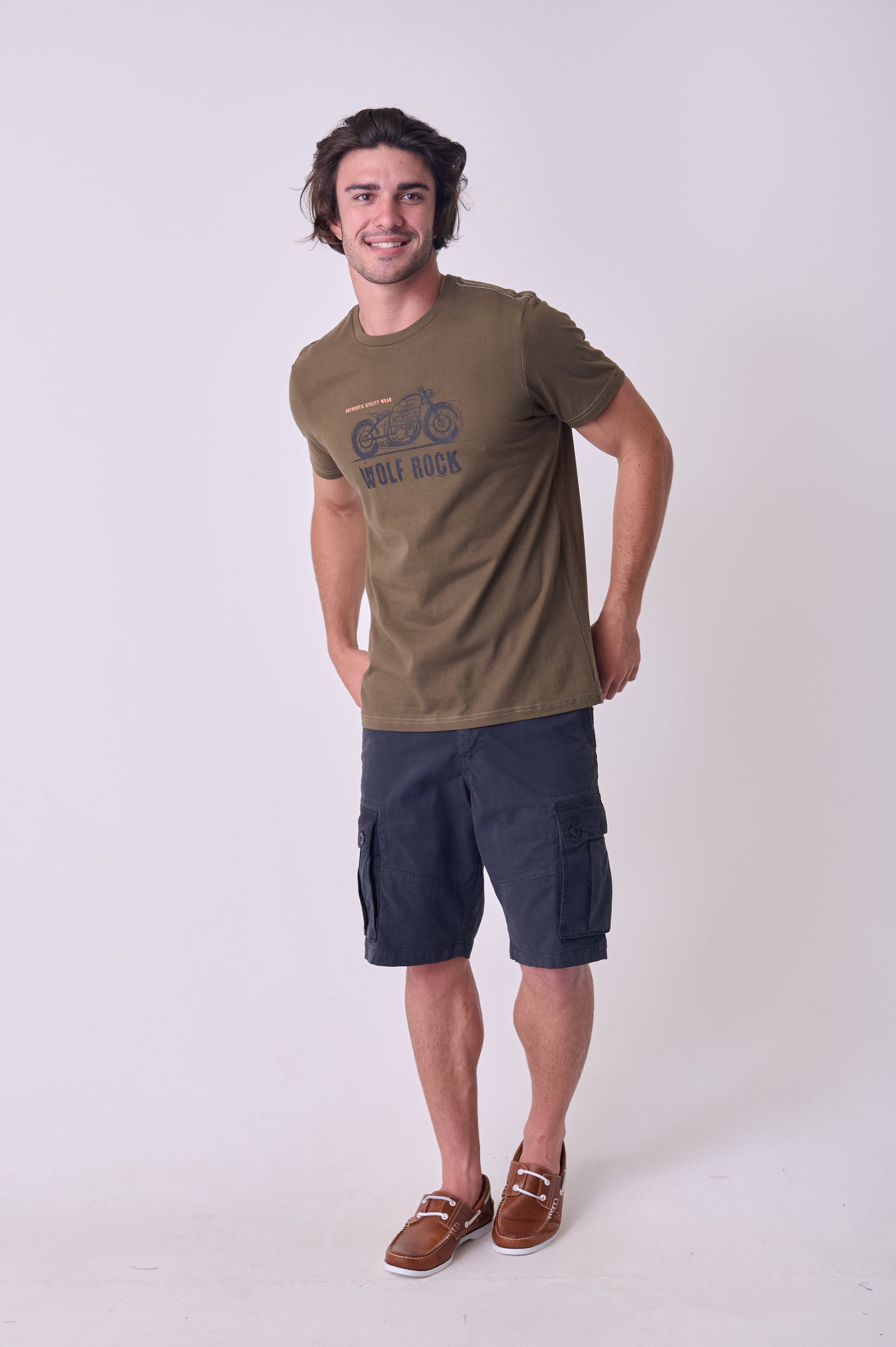 Front view  of the Wolf Rock Road Untaken Tee in Bronze, showing the large adventure-themed graphic print.