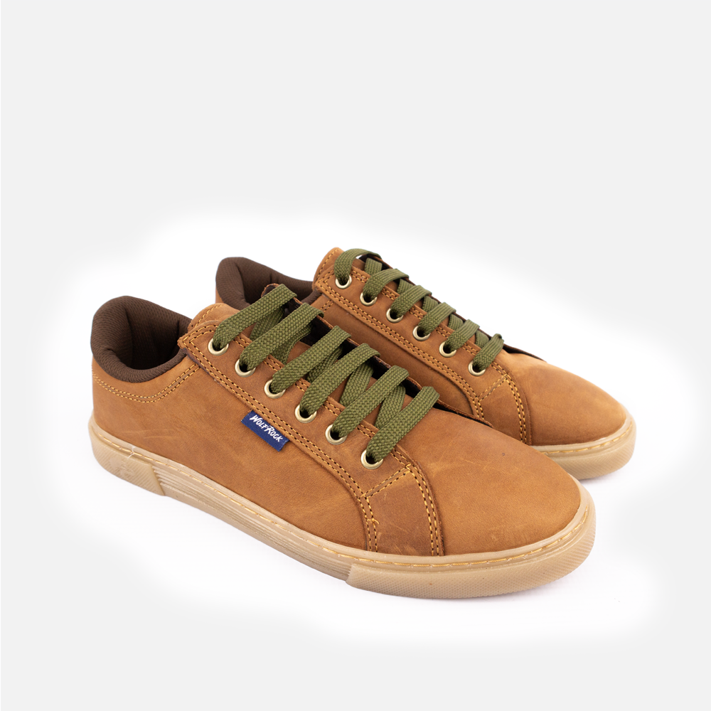 Pair of Wolf Rock Cayden Sneakers in Houston Tan leather, showing olive lace detail and toffee sole.